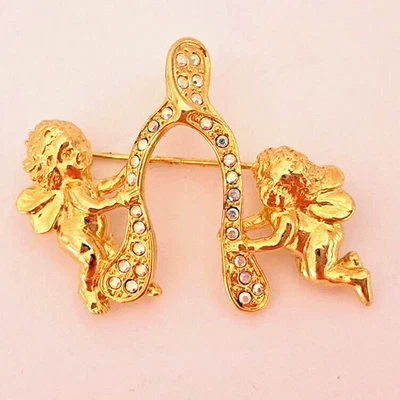 Kirks Folly Cherubs/Angels with Wishbone Gold-tone Rhinestone Pin - Image 1 of 4