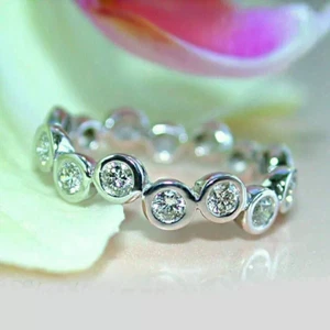 1.30 Ct Round Cut Moissanite Women's 14K White Gold Plated Eternity Band Ring - Picture 1 of 4