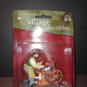 ⭐️ Holiday Time Village Collectibles O'Well Man sharpening a tool NEW (A3 - Picture 1 of 6