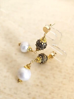 orecchini in stile etnico in argento 925 e perle naturali - Immagine 1 di 4