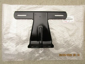 69 - 84 TOYOTA LAND CRUISER FJ40 FJ43 FJ45 FRONT LICENSE PLATE BRACKET OEM NEW - Picture 1 of 3