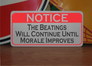 The Beatings Will Continuous Until Moral Improves Metallschild  - Bild 1 von 3