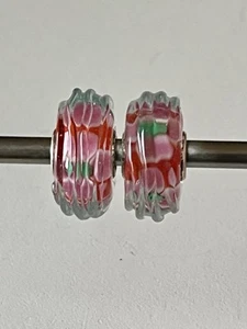Trollbeads 🍀 1 Riffel in rot mit pink/grünen Blumen, links 🍀 LAA925 - Bild 1 von 7