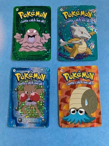 From 2000 – 4 Pokemon Prism Cards – Grimer / Marowak / Hitmonchan / Omanyte - NM - Picture 1 of 2