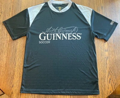 Camiseta Arth Guinness Fútbol Irlanda Poliéster Negra Blanca Talla L Grande Usada en Excelente Condición Foto 1 de 4
