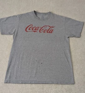 T-shirt grande vintage Coca-Cola Fruit Of The Loom 41 x 27 macchiata in tutto  - Foto 1 di 8