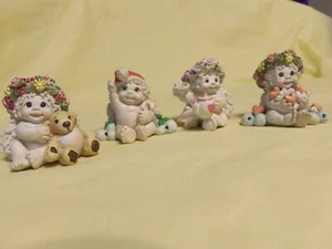 4 - Cast Art Dreamsicles Figurines 2"x2" Holding Different Things - Picture 1 of 5