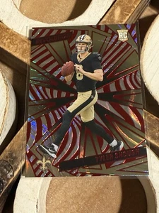 2025 Panini Revolution Tyler Shough Red Swirl #246 Saints RC - Picture 1 of 2