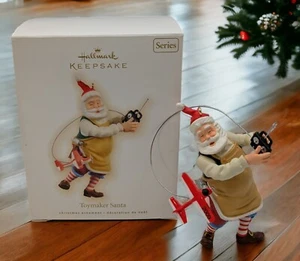 RC Airplane Toy Maker Santa Claus 2009 Hallmark Christmas Tree Ornament - Picture 1 of 4