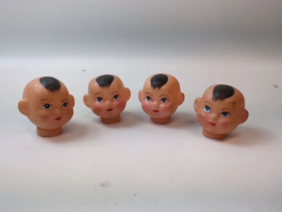 Juego de 4 cabezas de muñeca de goma vintage Foto 1 de 3