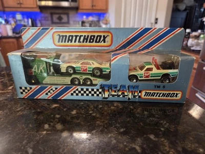 Vintage Matchbox 1984 TM-5 Team Matchbox 7UP Set Car Hauler & 2 Cars 1/64 NOS - Image 1 of 4