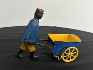 ANTIQUE 1910's TIN FERDINAND STRAUSS WIND UP TIP-TOP PORTER TOY - Picture 1 of 4