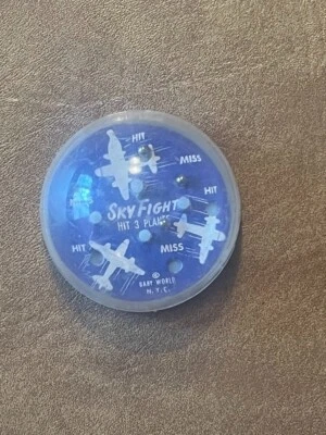 Vintage SKY FIGHT Handheld Metal Ball Small Toy Plane Game by Baby World N.Y.C. - Image 1 of 4