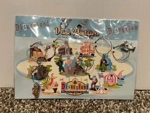 Disneyland 50° Anniversario Identificatori Bevande/Ciondoli Vino 2005 Set di 6 Nuovi con scatola Nuovi con scatola - Foto 1 di 2