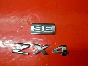 05 06 07 FORD FOCUS REAR BACK EMBLEM BADGE MARK NAME LOGO ZX4 SE SILVER SET OEM - Bild 1 von 4