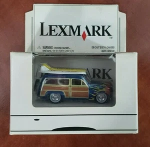 Johnny Lightning - Lexmark 1/64 Scale Mercury Woody Wagon Metalic Blue w/Flames - Picture 1 of 7