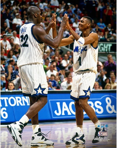 Penny Hardaway Orlando Magic Unsigned High-Fiving Shaquille O'Neal Photo Cover