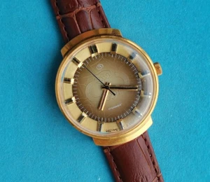 Orologio VOSTOK WOSTOK Giochi Olimpici 1980 Placcato Oro AU10 mov.2409A RICONDIZIONATO USSR - Foto 1 di 21