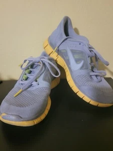 Nike Free Run Livestrong 487866-017 grau gelb Unisex Größe 5,5 von 2011  - Bild 1 von 10