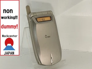 【Factice !】 KYOCERA A1012KII (couleur or) au-japon téléphone portable qui ne fonctionne pas - Photo 1 sur 3