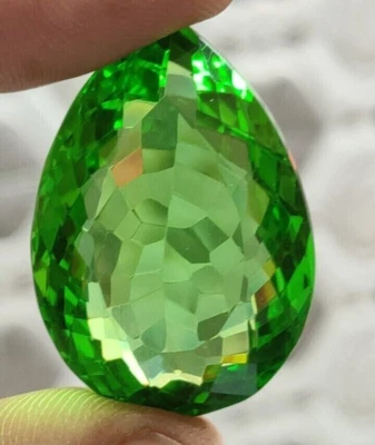 AAA+ 68.85 Ct. Green Peridot Translucent Faceted Pear Cut Loose Gemstone Ring - Image 1 of 4