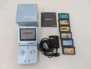 L1221 Nintendo Gameboy Advance SP Consola Azul Perla Japón Juego GBA con caja - Imagen 1 de 11
