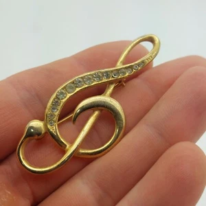 Spilla stile nota musicale vintage 2" tono oro strass trasparente accentato G  - Foto 1 di 2