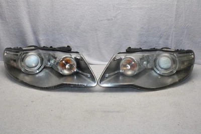 Par de faros laterales izquierdo + derecho Volkswagen Touareg 2008-2010 xenón originales OEM Foto 1 de 4