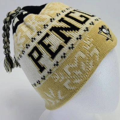 Pittsburgh Penguins Black&Gold Reebok Face Off Tassel Knit Embroidered Beanie - Image 1 of 4