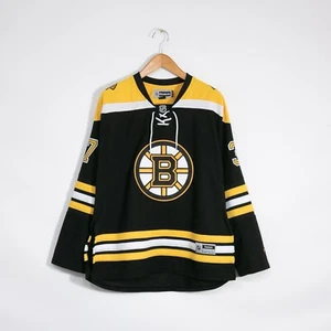Maglia Reebok Boston Bruins donna 2XL - numero 37 Patrice Bergeron NHL Hockey - Foto 1 di 10