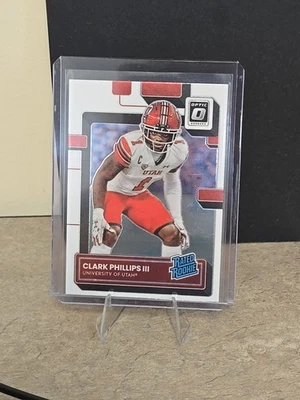 2023 Panini Chronicles Draft Picks - Donruss Optic Rated Rookies Clark Phillips - Image 1 of 2