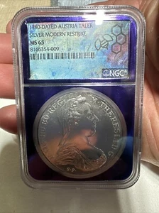 1780-DATED AUSTRIA TALER NGC MS65 Trader Bea Purple Core! - Picture 1 of 2