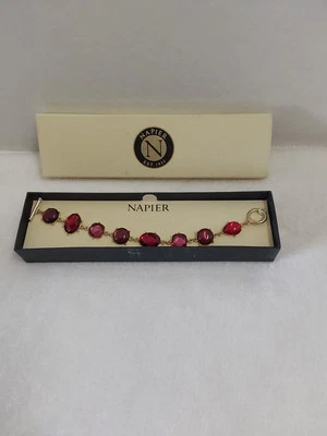 Brazalete Napier tono dorado con pedrería rojo y púrpura ¡NUEVO EN CAJA! Foto 1 de 4