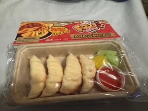 Foodie Fusion™ Squeezy Squishy Stress sensorisches Zappeln Schweineknödel Neu mit Etikett - Bild 1 von 3