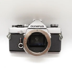 Olympus OM-1 analoge Spiegelreflexkamera 35 mm silber - getestet, funktionsfähig, sauber - Bild 1 von 10
