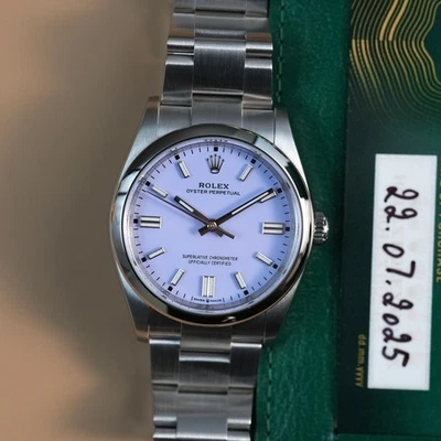 Rolex Oyster Perpetual 126000 Oyster Pulsera con Bisel de Plata Lavanda Foto 1 de 4
