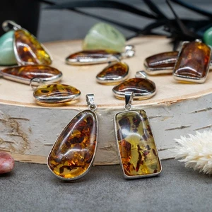 Colgante de plata fósil ámbar natural naranja cristal reactivo UV boho joyería regalo - Imagen 1 de 7