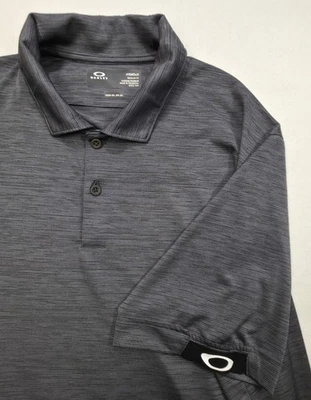 Camisa Polo Oakley Hombre 2XL Gris Negra Hydrolix Performance Golf Uso Limitado Foto 1 de 4