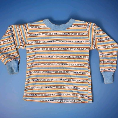 Camisa vintage para niños años 70 touchdown estampado de hechizos por todas partes  Foto 1 de 4