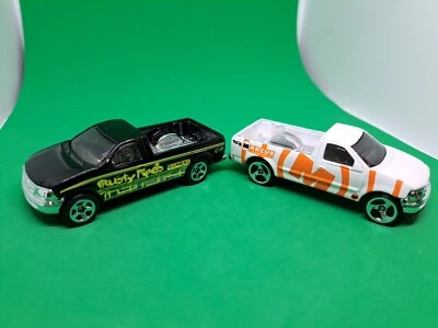 Hot Wheels 1997 White Ford F-150 Pickup & Black Ford F-150 Pickup  - Image 1 of 4