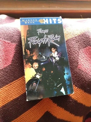 Vintage PRINCE Purple Rain VHS Tape 1984 Warner Bros Hits Foto 1 de 3