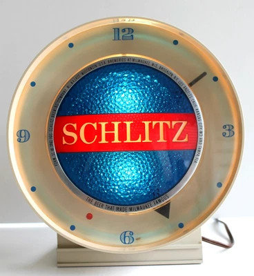 Reloj Schlitz Motion Spinner, años 60, funciona bien con luz azul Foto 1 de 4