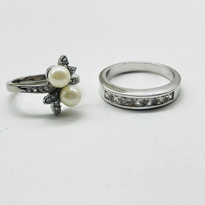 Stainless Steel Ring Lot of 2 Womens Bypass Faux Pearl Crystal and Channel Band - Image 1 of 4