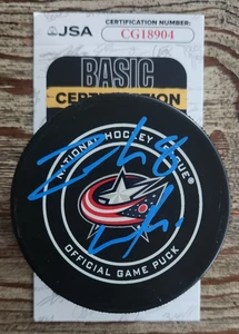 Zach Werenski Signed Official NHL Game Puck w/ JSA COA Columbus Blue Jackets - Picture 1 of 2