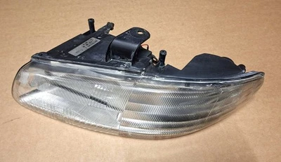 Scheinwerfer links Chrysler Voyager GS 98-00 Europaversion 04897389AC - Bild 1 von 4