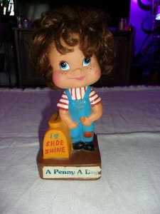 7 1/2" tall Vinyl Bank Shoe Shine "A Penny A Day" Boy with Hair - Picture 1 of 4