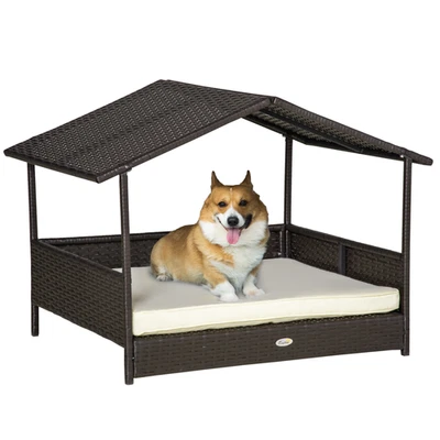 Cama elevada de mimbre para perros con dosel de ratán y almohadilla para dormir acolchada Foto 1 de 4