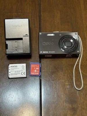 Pentax Digital Camera Optio RS1000 14MP F3.2 wide 4X Optical Zoom FOR PARTS - Image 1 of 4