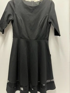Lulu’s NEU schwarzes Kleid MED Stretch Strick transparent Netzbesatz Full Swing Rock gefüttert - Bild 1 von 9