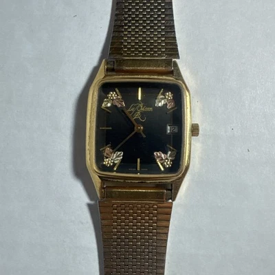 LE MANN SWISS MADE MENS WATCH BLACK HILLS GOLD ACCENTS BLACK DIAL RUNS GREAT - Image 1 of 4